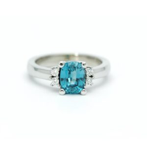 Witgouden ring met natuurlijke diamant en natuurlijke blauwe zirkoon